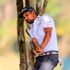 Greg Snow follows his shot from 18th hole fairway during Magical Kenya Open at Muthaiga Golf Club 
