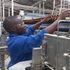 A worker at Keroche Breweries in Naivasha