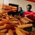 Employees package bread at a bakery in Khartoum Sudan