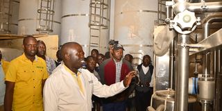 Nandi governor inspecting the Nandi Dairy Cooperative processing plant.
