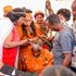 Mama Ngina Kenyatta shaves Field Marshall Mary Muthoni Wa Kirima'