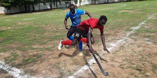 Edwin Agoro (right) of Parkroad Badgers vies with Eddy Newton of Mombasa Sports Club