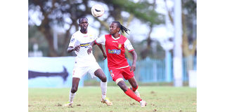 Kenya Police midfielder Francis Kahata (right) vies with Kakamega Homeboyz defender Eric Ambunya