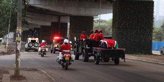 Kibaki's solemn procession