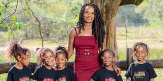 Divinar Joseph poses with her children