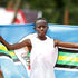 Kenyatta University's Diana Wanza celebrates after winning the women's 10,000 metres final