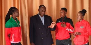 Malkia Strikers players and Charles Nyaberi