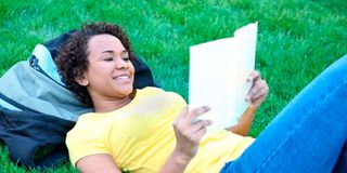 A student reading a book.