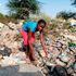 Alice Wambui Chege, 16, at Dandora dumpsite where she works.