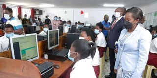 CAS ICT Maureen Mbaka during an inspection tour of the computer laboratory at Sironga Girls High School