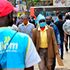 Nairobi residents walk along Tom Mboya Street