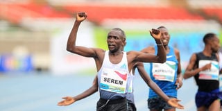 Amos Serem celebrates after finishing men's 3,000 metres steeplechase