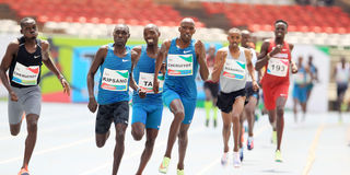 Abel Kipsang (left) competes with Timothy Cheruiyot during the men's 1,500 metres final