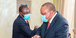President Uhuru Kenyatta (right) and his deputy William Ruto.