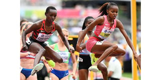 Bahrain's Winfred Mutile Yavi (right) and Kenya's Celliphine Chepteek Chespol 