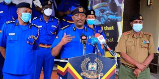Inspector General of Police Hilary Mutyambai flanked by top security officials.