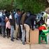 Members of the public queue to register as voters in Eldoret.