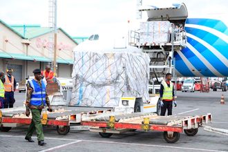 Presidential ballot pallets being offloaded from an EgyptAir plane at JKIA.