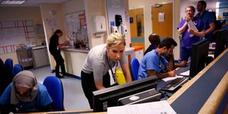 Members of clinical staff at the Royal Albert Edward Infirmary in Wigan, northwest England.