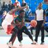 City Thunder point guard Griffin Ligare (right) dribbles for a basket past University of Nairobi "Terror" David Odanga
