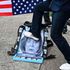 A pro-Beijing protester stamps on an image depicting the US House Speaker Nancy Pelosi 