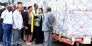 IEBC commissioners and political parties' representatives receive the presidential ballot pallets at JKIA.