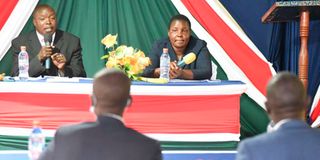 Isaac Choge, an independent candidate and Lucy Tololei a UDA candidate during a debate.