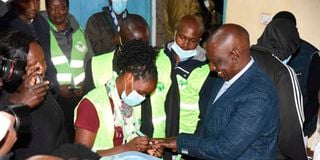 Ruto votes at Kosachei Primary School.
