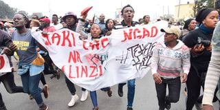 Kenyans take part in a procession along Nairobi streets 
