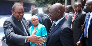President Uhuru Kenyatta (left) and President-elect William Ruto