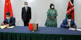 Kenyan and Chinese officials signing of bilateral agreements.