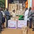 Elgeyo Marakwet Governor Wisley Rotich (in a blue tie) receives a consignment of drugs worth Sh7 million from KEMSA
