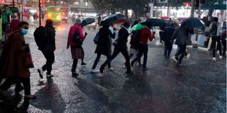 Rains pound the streets of Nairobi.