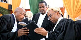 Lawyers converse Supreme Court