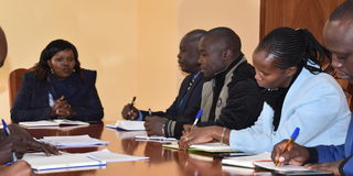 Elgeyo Marakwet Deputy Governor Professor Grace Cheserek with National Youth Service (NYS) officials in a meeting 