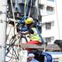 Kenya Power staff work on restoring power in the Ganjoni area in Mombasa County.