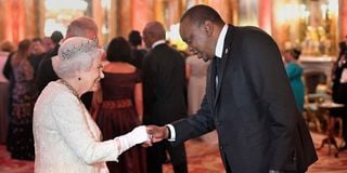Queen Elizabeth II greets President Uhuru Kenyatta 