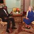 .British Queen Elizabeth II talks with former Kenyan President Daniel Arap Moi 