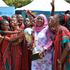 Mama Ngina Girls from Coast Region celebrate alongside their Principal Omar Mwanahamisi