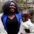 Carol Mukiri with her seven-year-old identical twins Favour Karimi and Blessings Kathure.