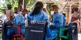 Health workers prepare for an Ebola vaccination drive in Mbandaka, DR Congo.