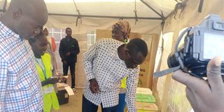 Former Turkana Governor Josphat Nanok casting his vote at Lodwar Handcraft Polling Station in Turkana Central