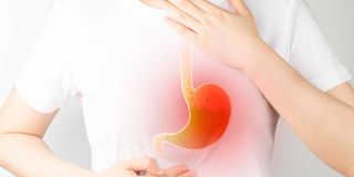 Heartburn is an irritation of the upper chest, and may be accompanied by regurgitation of food.
