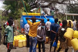 Lodwar town residents scramble for water outside Lodwar Water and Sanitation Company office on September 19, 2022