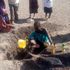 A woman from Atapar village in Turkana North sub-county in search of clean water from a scooping hole 