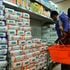 Customers shop for subsidized maize flour at the Naivas Supermarket.