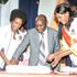Teachers Service Commission chairman Jamleck Muturi and CEO Nancy Macharia cut a cake to mark World Teachers Day.