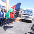 Narok Governor Patrick ole Ntutu (with flag) flagging off medical drugs worth Sh90million 