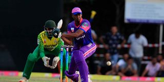 Purple Dot Ndovus batsman Emmanuel Bundi plays a delivery