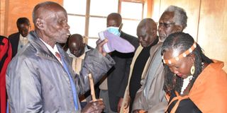 Elder Wilson Chesire blessings on activist Ms Jerotich Seii after she was endorsed by her Kaplegenui clan 